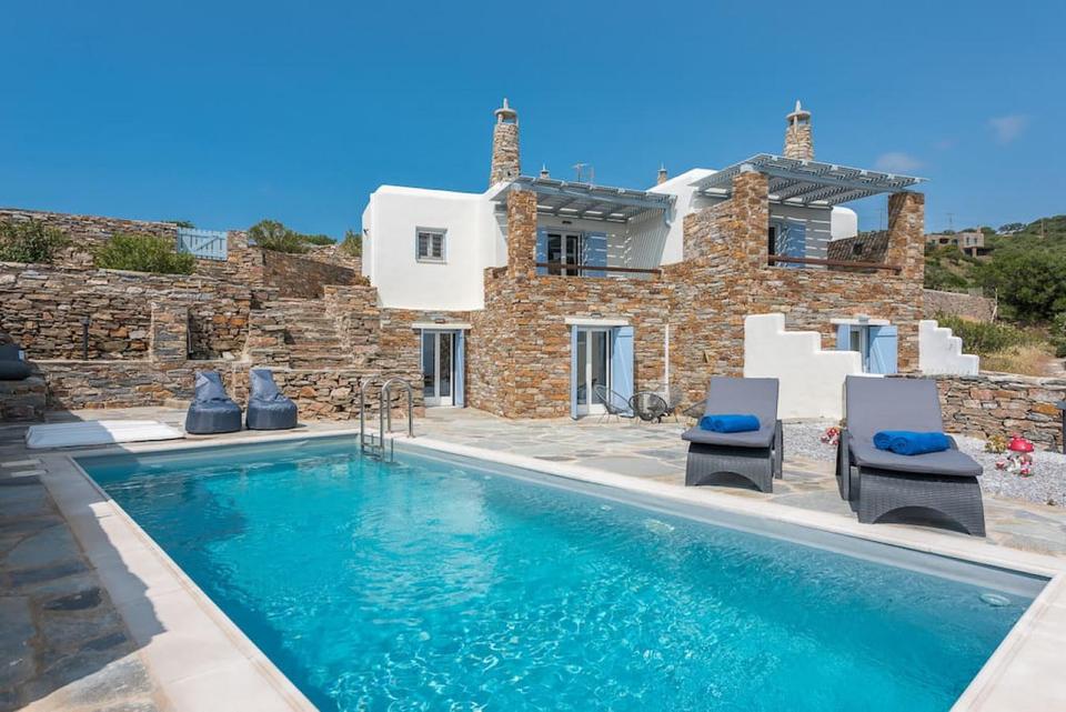 Hostaway customer WelcomeHost is Athens' leading short term and vacation rental company. This image shows an outdoor pool at one of their properties. Learn why they made the switch from Guesty to Hostaway. 

