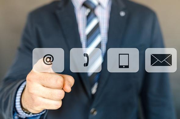 A virtual interface displaying communication icons for email, phone, mobile, and messaging.