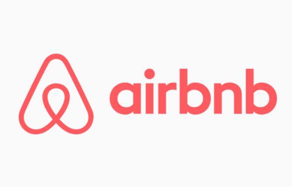 Logo of Airbnb