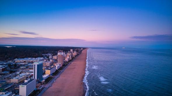 As Virginia's primary beach destination, the Virginia Beach oceanfront is a high-demand area for tourism, leading the city to enforce comprehensive short-term rental regulations, including strict zoning and insurance requirements.