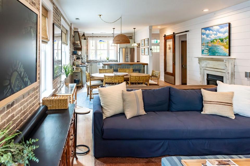 Living room of a property by Away by the Sea